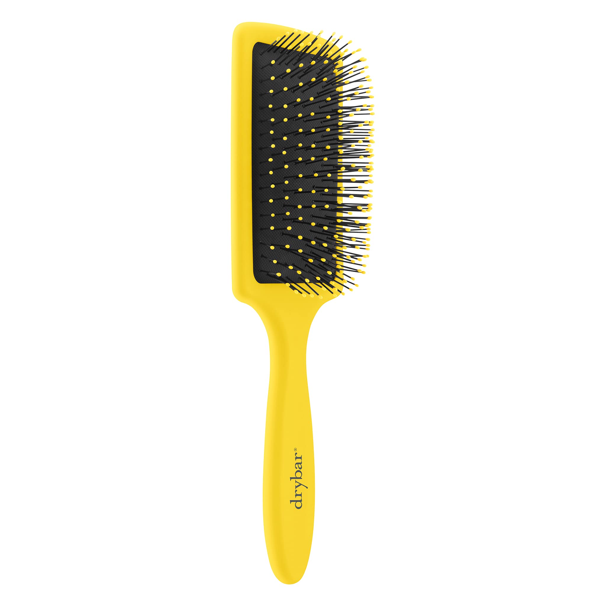 Drybar Lemon Bar Paddle Brush soft-touch grip offers slip-free comfort during styling.