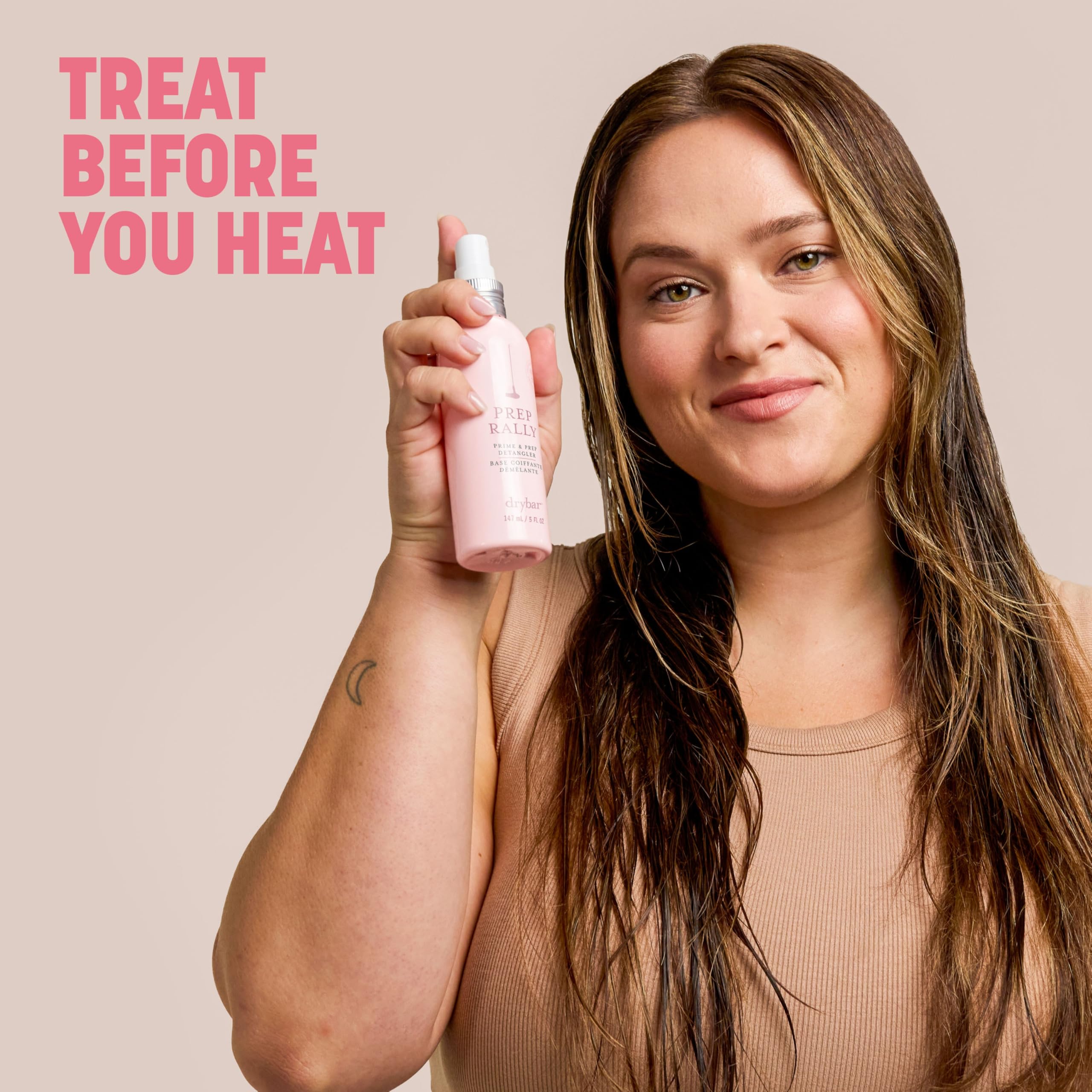 Drybar Prep Rally protects hair up to 450°F during heat styling.