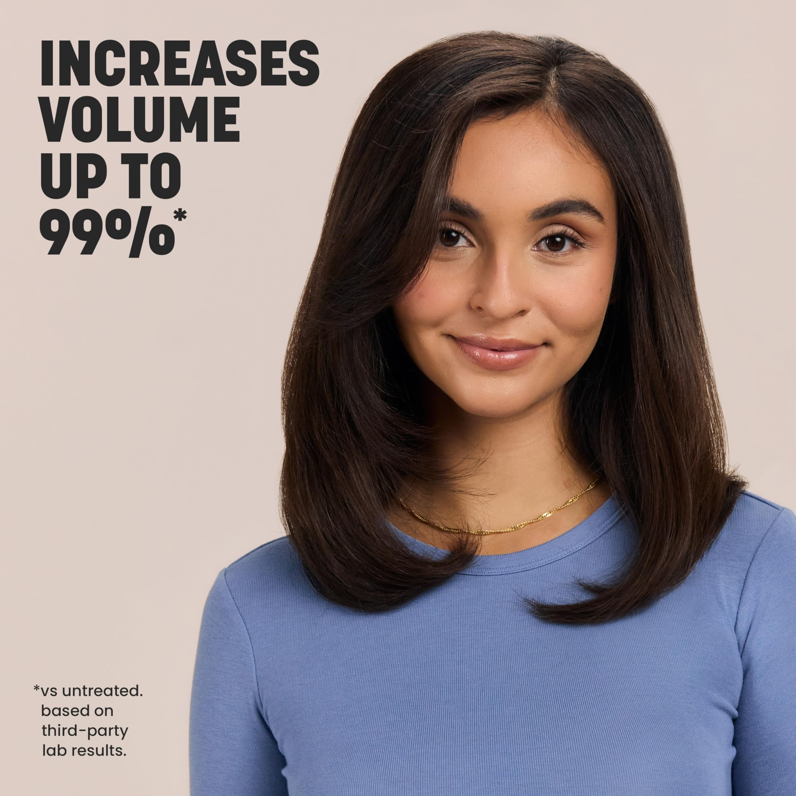 Drybar model hair showing volumized roots after using the root-lifter.