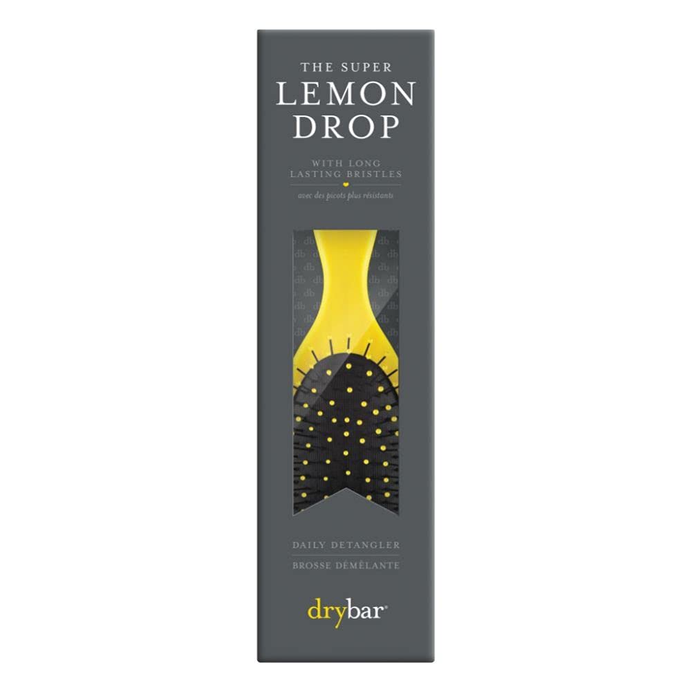 Drybar Super Lemon Drop detangling brush bristles gliding through knots
