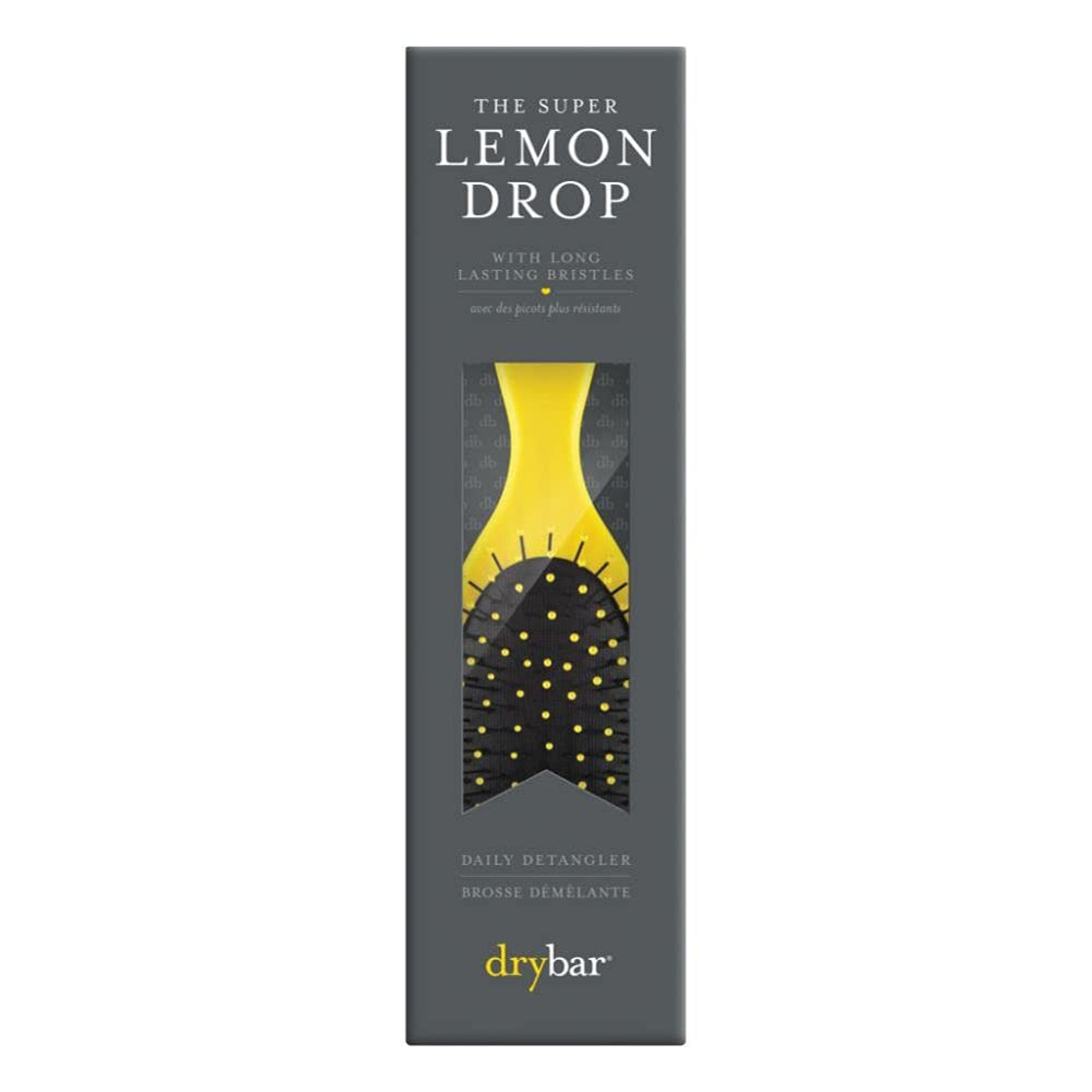 Drybar Super Lemon Drop detangling brush bristles gliding through knots