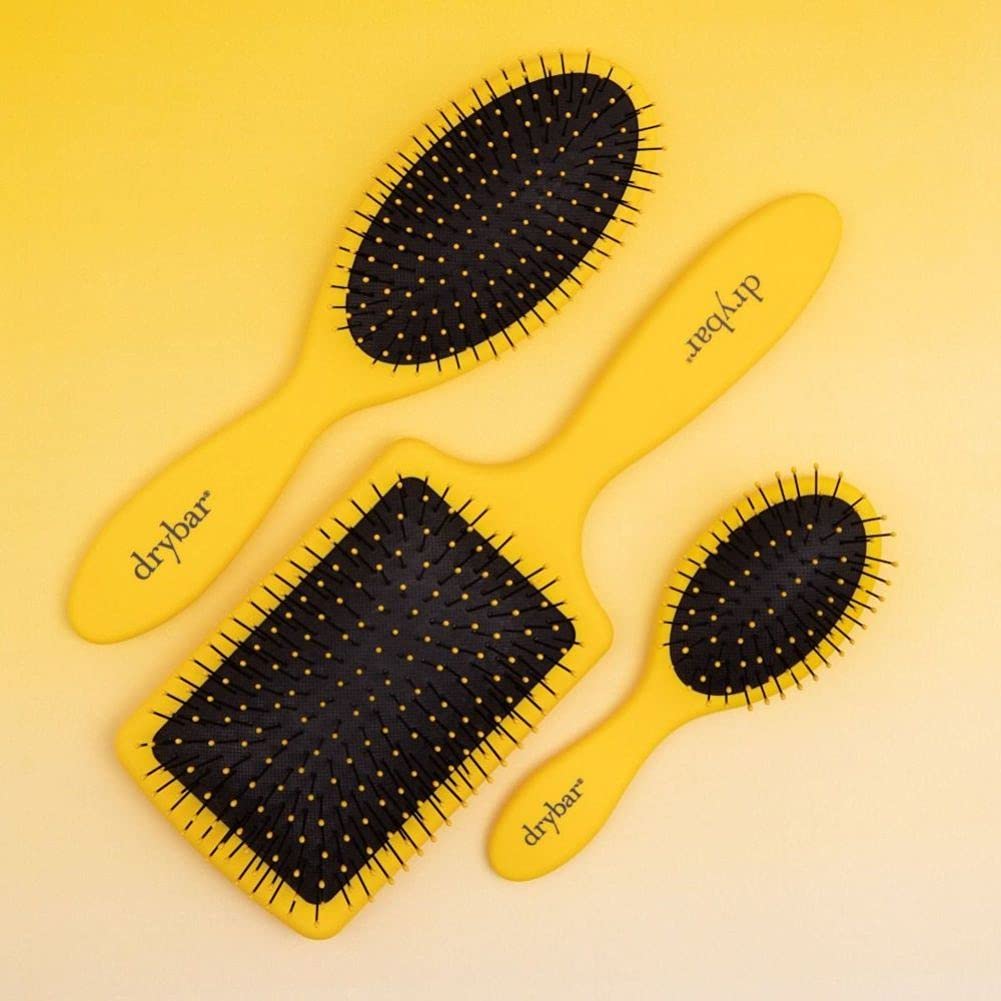 Drybar Super Lemon Drop detangling brush handle for slip-free control