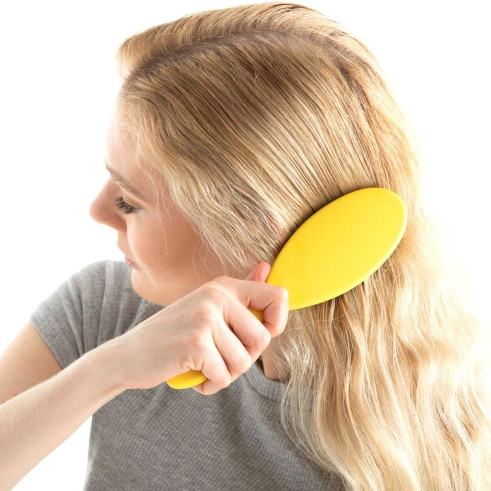 Drybar Super Lemon Drop detangling brush soft-touch finish for comfortable grip