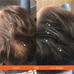 Hands applying Revita Conditioner to hair for smoother strands.