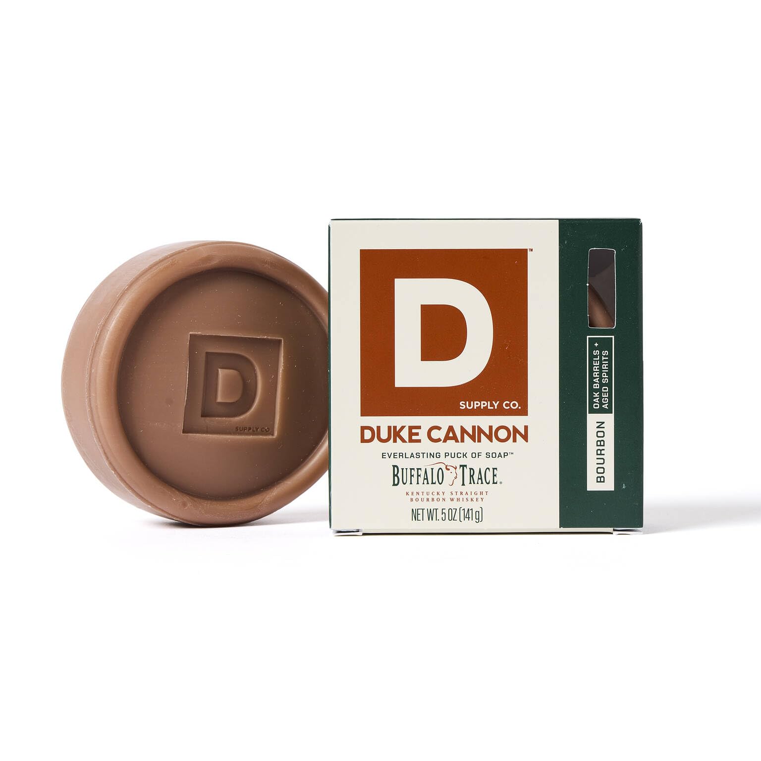 Duke Cannon Bar Soap Puck in hand shows durable, round design for an easy grip.