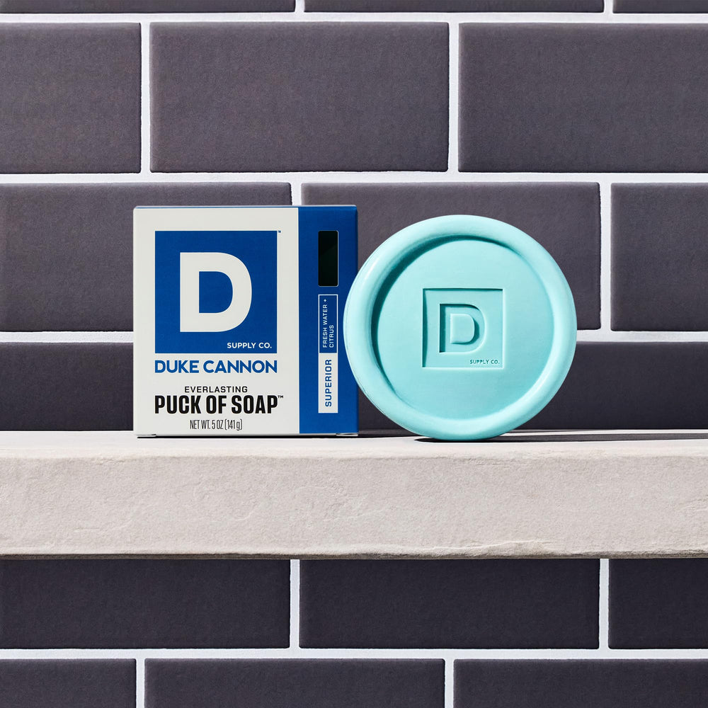 Duke Cannon Supply Co. bar soap puck hydrating exfoliating formula leaves skin soft.