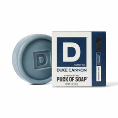 Duke Cannon Midnight Swim puck closeup shows rugged scent and durable formula.
