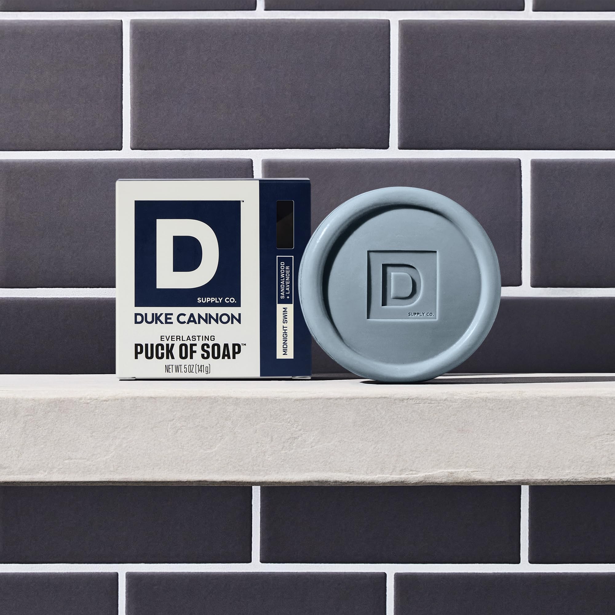 Duke Cannon soap puck emphasizes natural oils for hydrating cleanse.