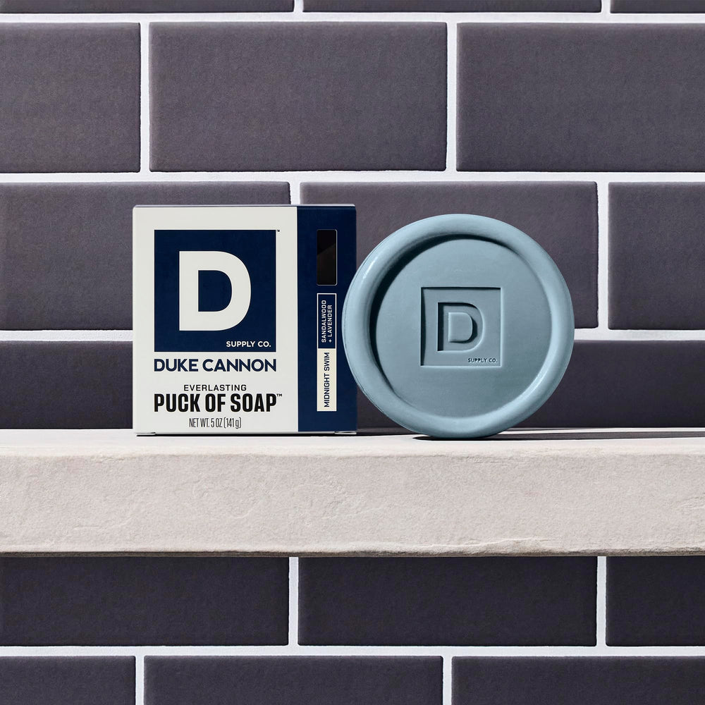 Duke Cannon soap puck emphasizes natural oils for hydrating cleanse.