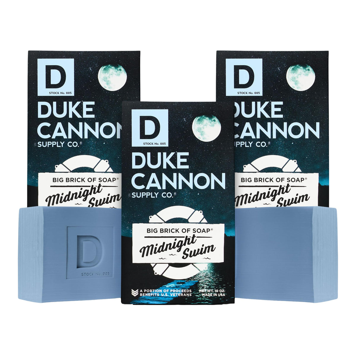 Duke Cannon Midnight Swim soap bar close-up showing a rich lather for daily cleansing.