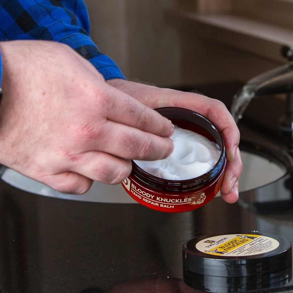 Duke Cannon Bloody Knuckles Balm application on hands demonstrates quick absorption.