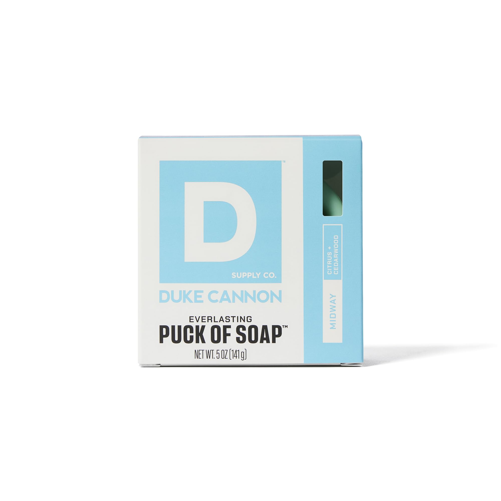 Duke Cannon Midway bar soap puck with citrus-sandalwood scent visible.
