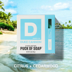 Duke Cannon Midway lathering soap puck in shower delivering rich foam for deep cleansing.