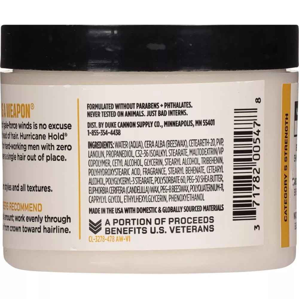 Duke Cannon News Anchor Hurricane Hold Pomade application in hand for styling texture.