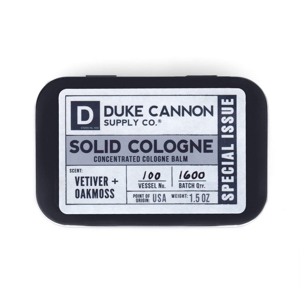 Duke Cannon solid cologne tin closed for travel and daily use.