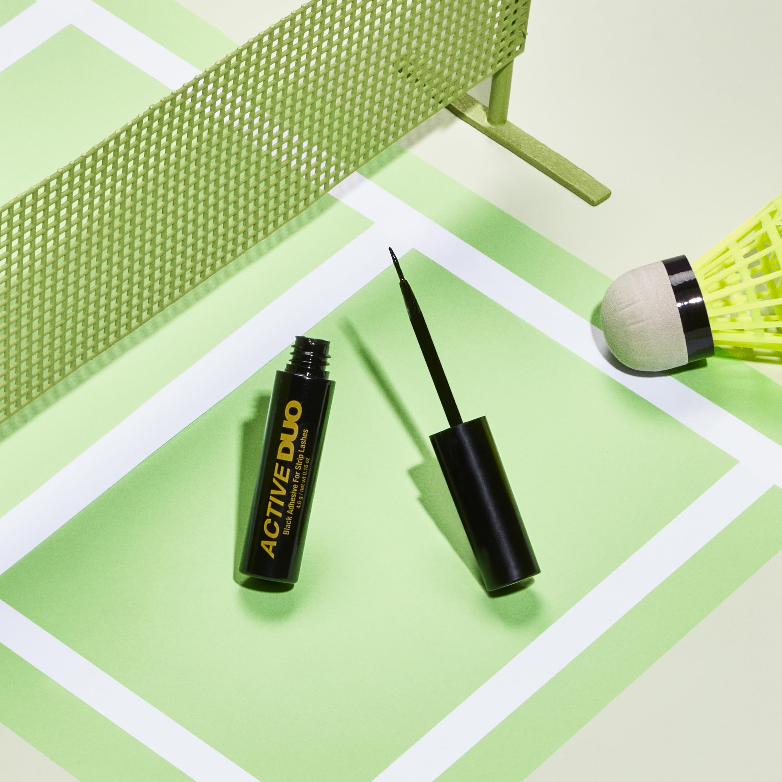 DUO Active Black adhesive holds lashes through activity.