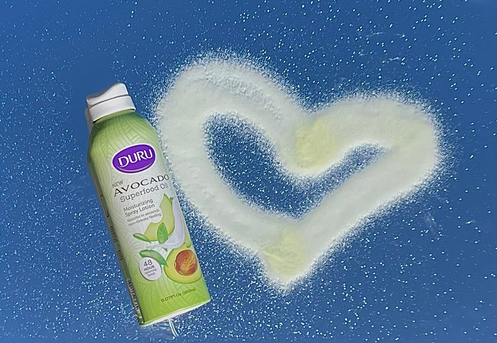 Close-up of spray mist providing quick, non-greasy absorption.