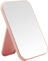 DVHOK pink princess desktop mirror on a vanity with a stable makeup check.