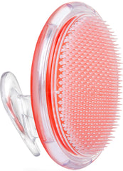 Dylonic exfoliating brush on the face for smooth pre-shave prep.