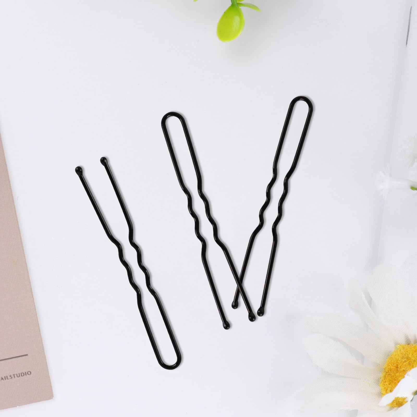 DySaLic 2.4-inch bun pins ideal for quick updos and formal looks.