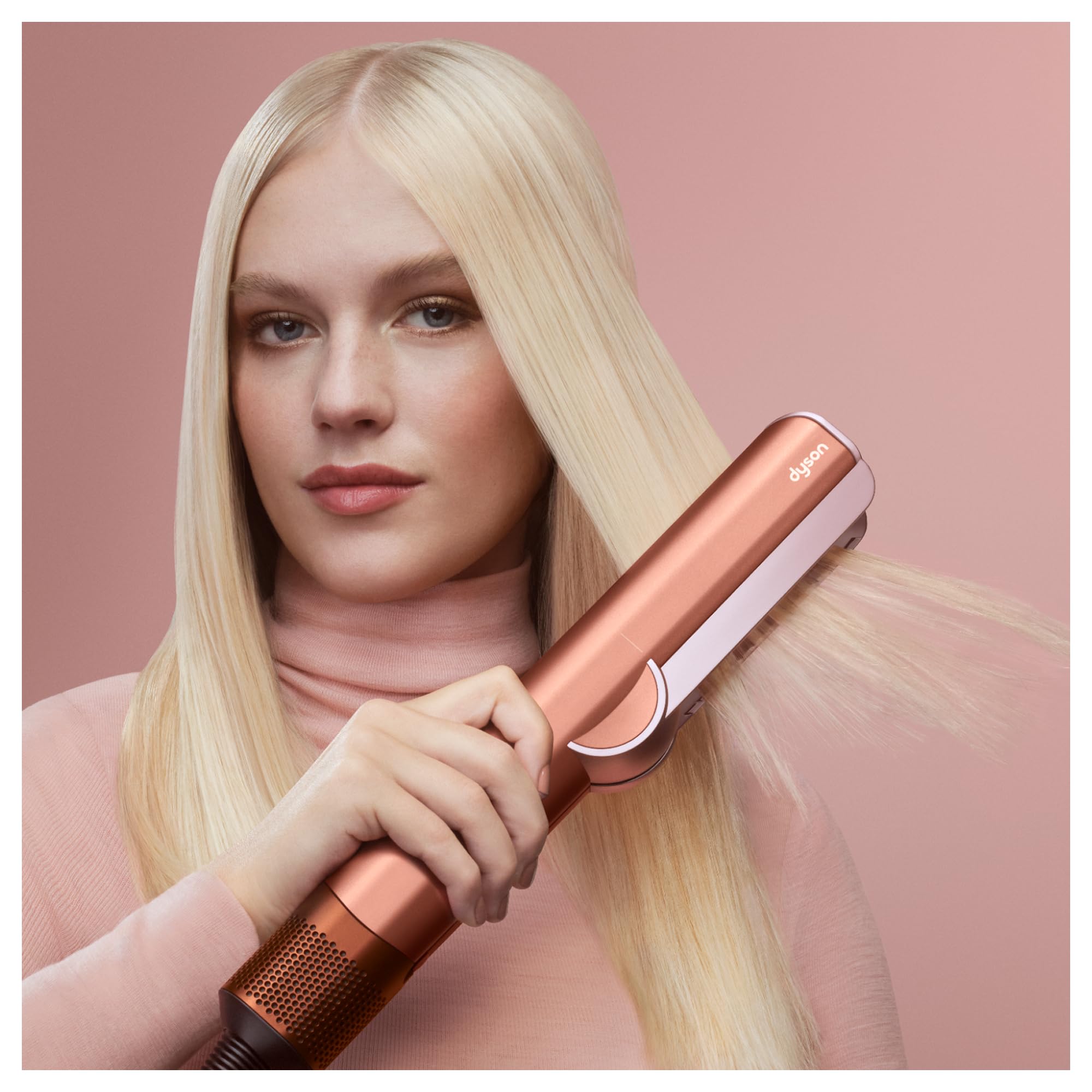 Dyson Airstrait 45-degree downward airflow aligns strands for a smooth finish.