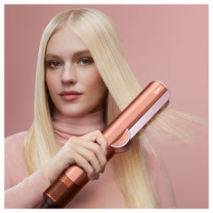 Dyson Airstrait 45-degree downward airflow aligns strands for a smooth finish.