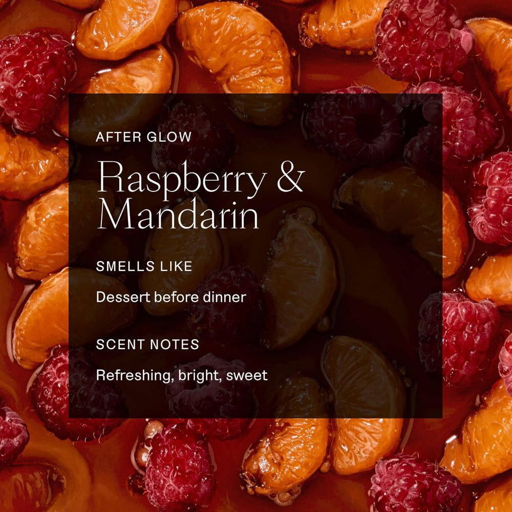 Each & Every raspberry-mandarin deodorant held in hands for travel.