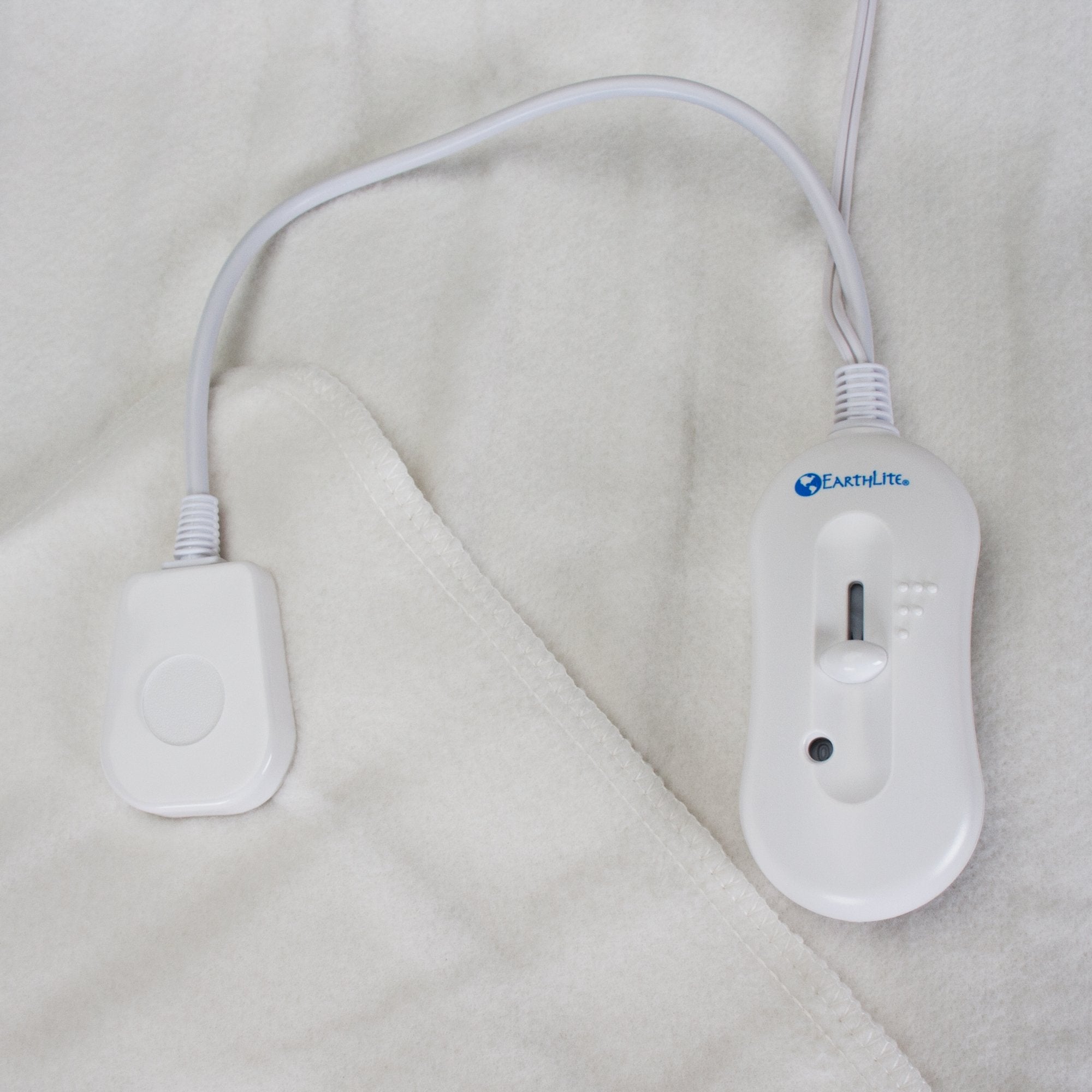 Large 30x71 inch EarthLite warmer fits full-sized tables with secure elastic straps.