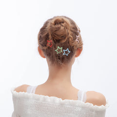 ECADY clip estrella metalico, diseño lúdico que asegura el cabello durante actividades.