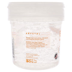 Close-up of hands applying Eco Style Krystal Gel for added body and moisture.