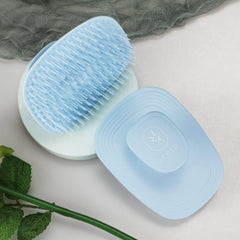 Ecoed scalp scrubber bristles close-up blue, exfoliating texture for dead skin removal.