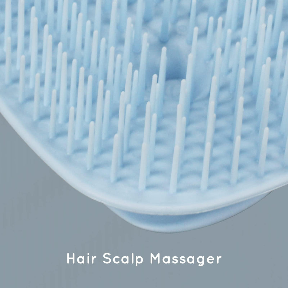Ecoed shampoo brush in shower with conditioner for a spa-like scalp massage.