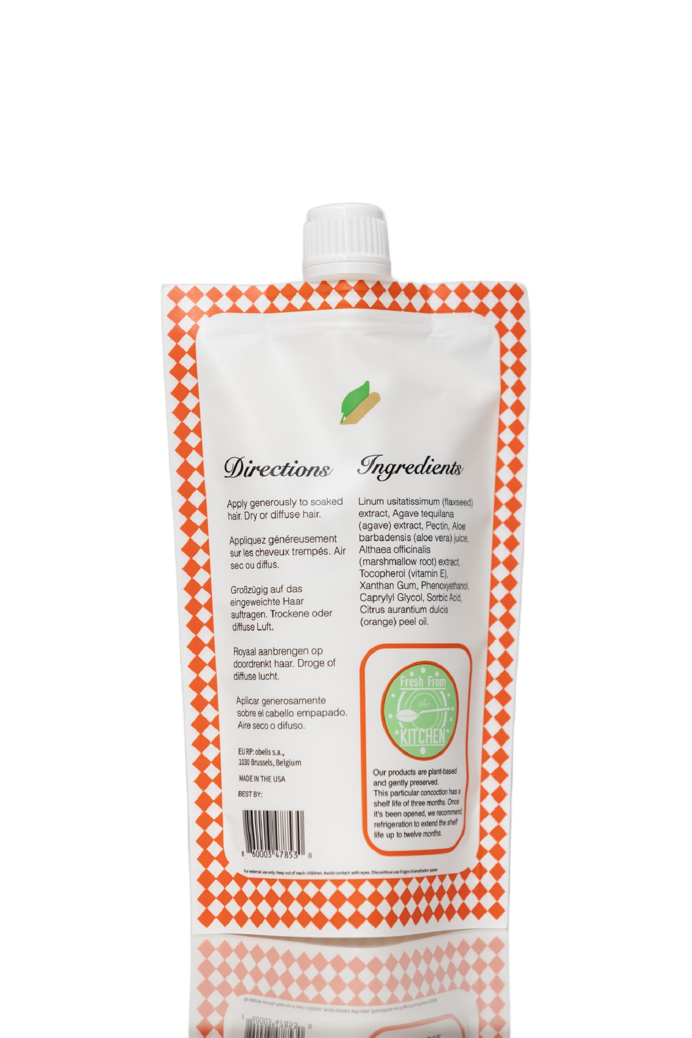 Ecoslay Orange Marmalade shine finish on healthy-looking curls.
