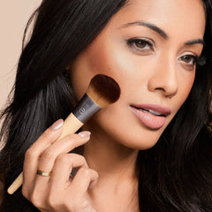 EcoTools bamboo-handle brush for comfortable, sustainable application.