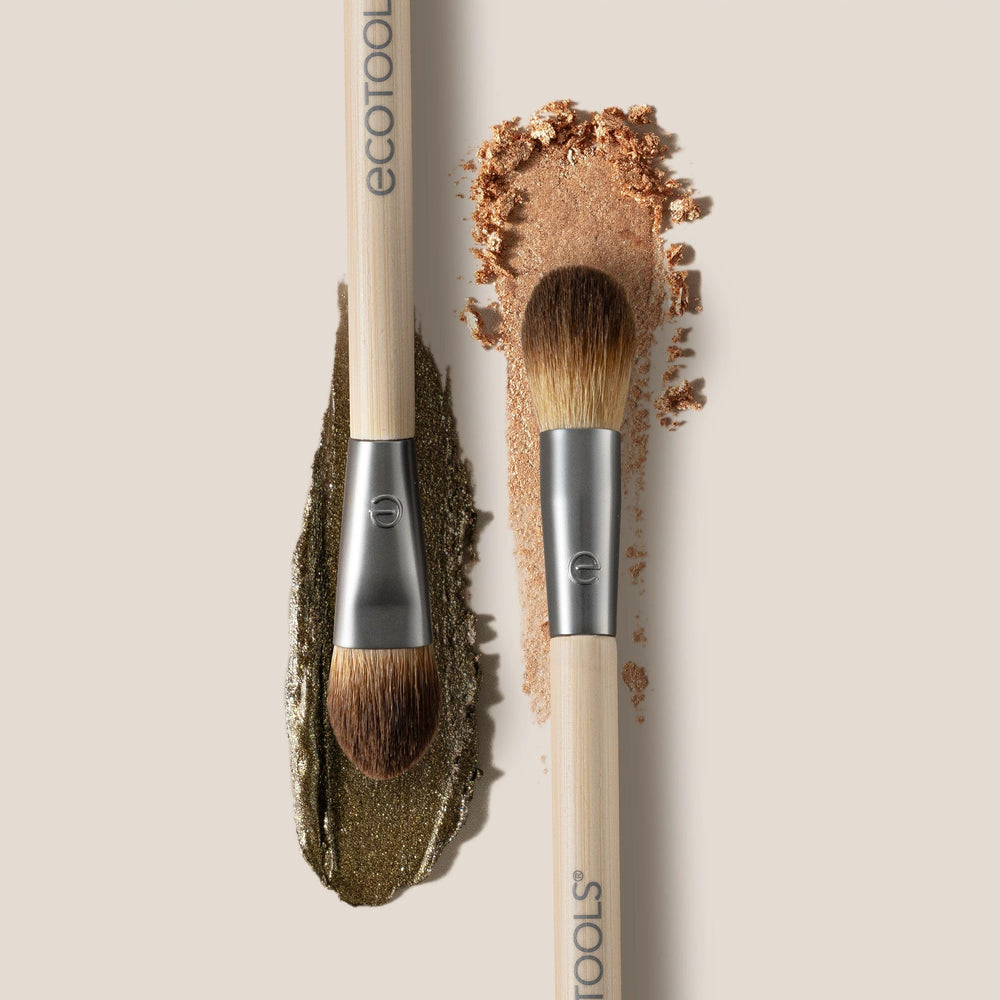 EcoTools dual-ended eye brush fluffy end diffuses pigment for crease and edge shading.