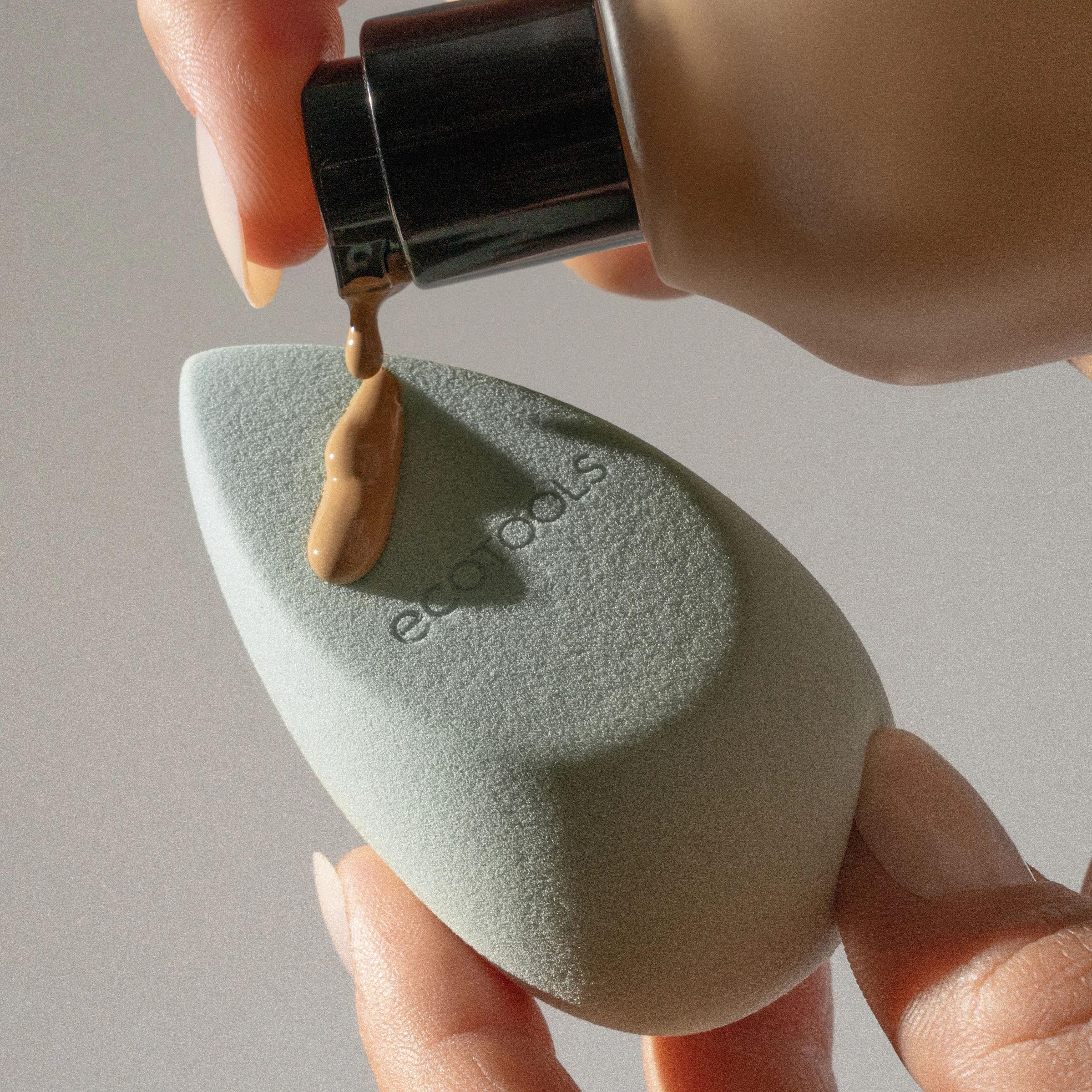 EcoTools cruelty-free vegan branding visible on packaging.