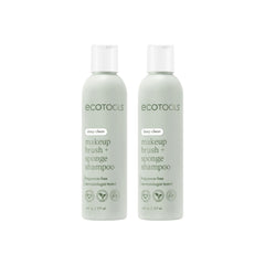 EcoTools brush shampoo two bottles on a clean vanity for smoother makeup application.