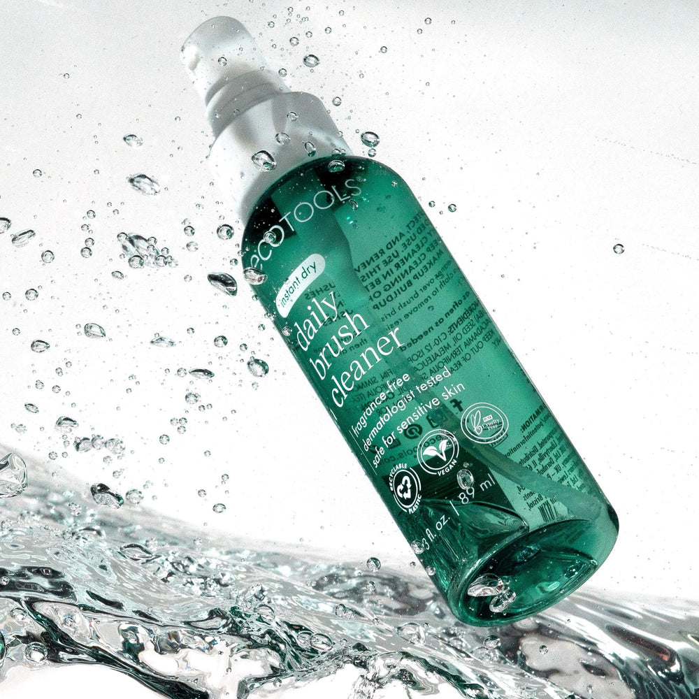 EcoTools Daily Brush Cleaner dermatologist-tested badge indicating skin safety