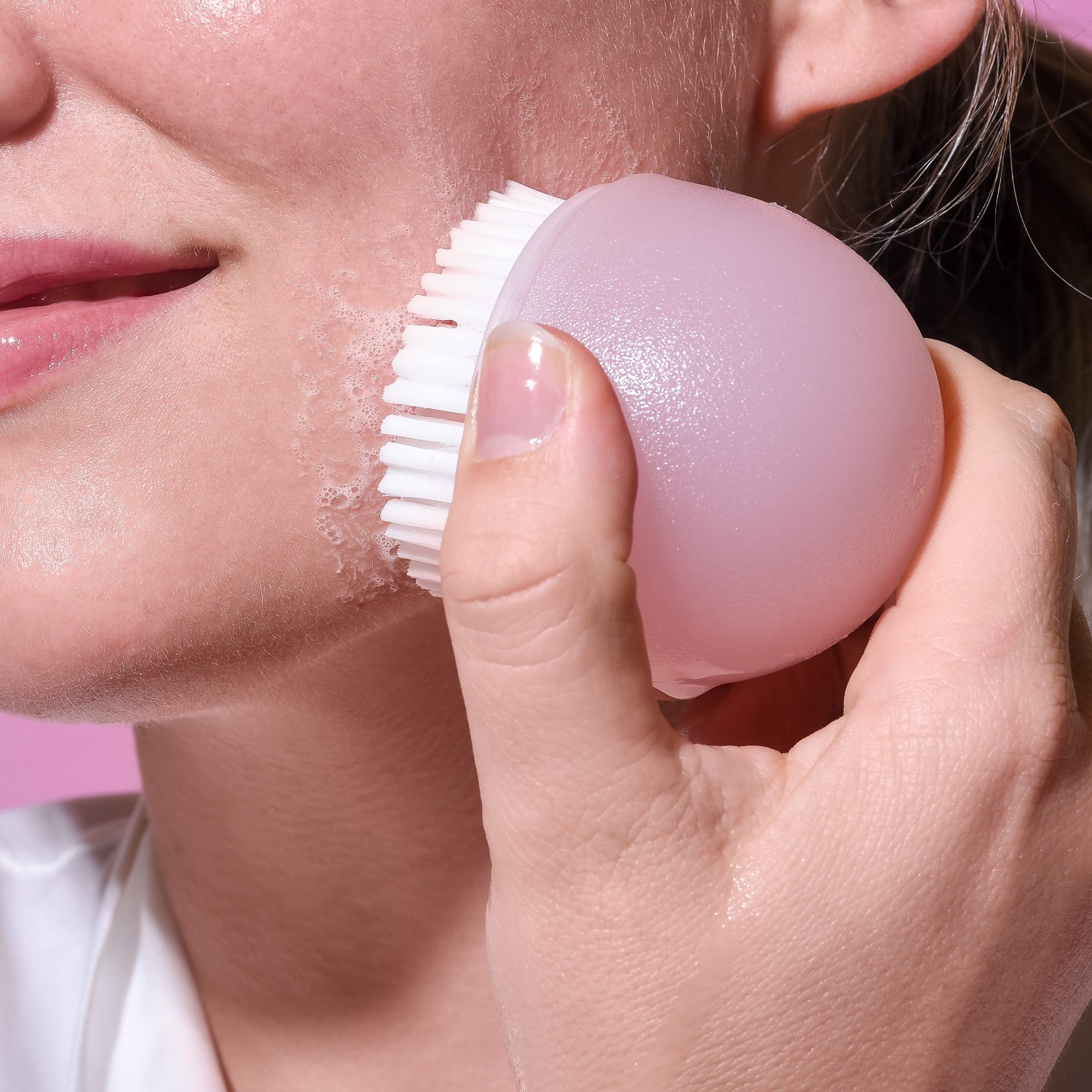 EcoTools Deep Cleansing Facial Brush rinsed under warm water after cleansing.