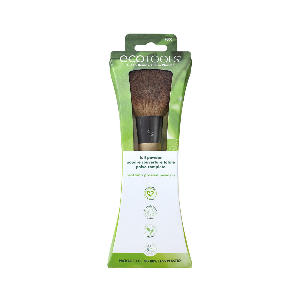 EcoTools Full Powder Brush handle bamboo close-up highlights sustainable craftsmanship and natural material.