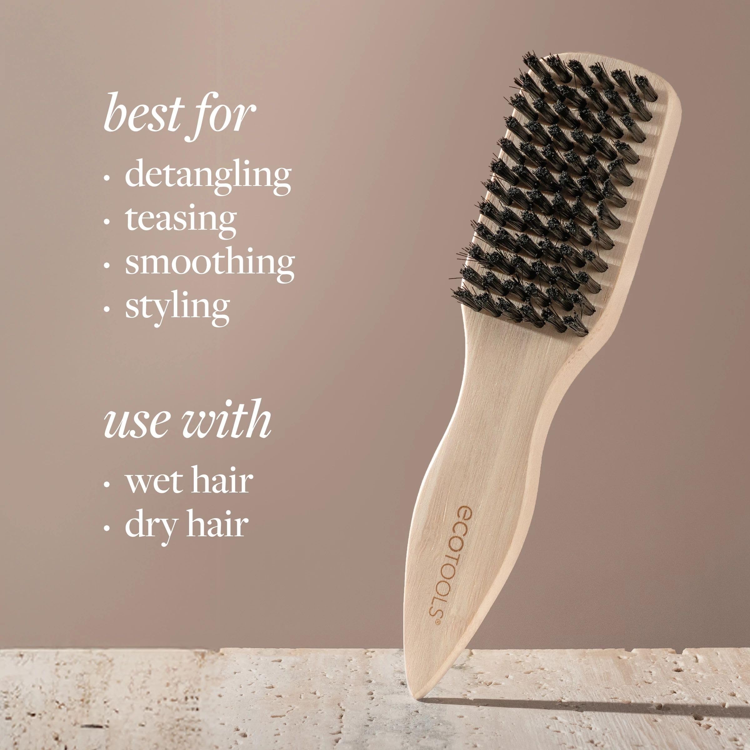 EcoTools Mini Slick Back Brush renewable bamboo handle highlights sustainable, comfortable grip.