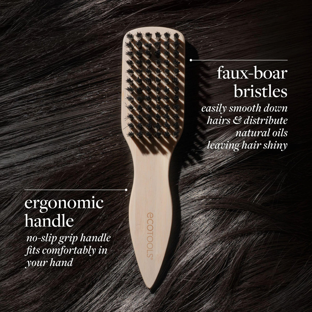 EcoTools Mini Slick Back Brush head close-up shows dense boar bristles for flyaway control.