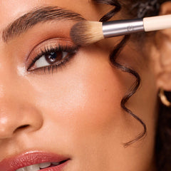 EcoTools dual-ended eye brush flat end presses cream or liquid shadow with control.