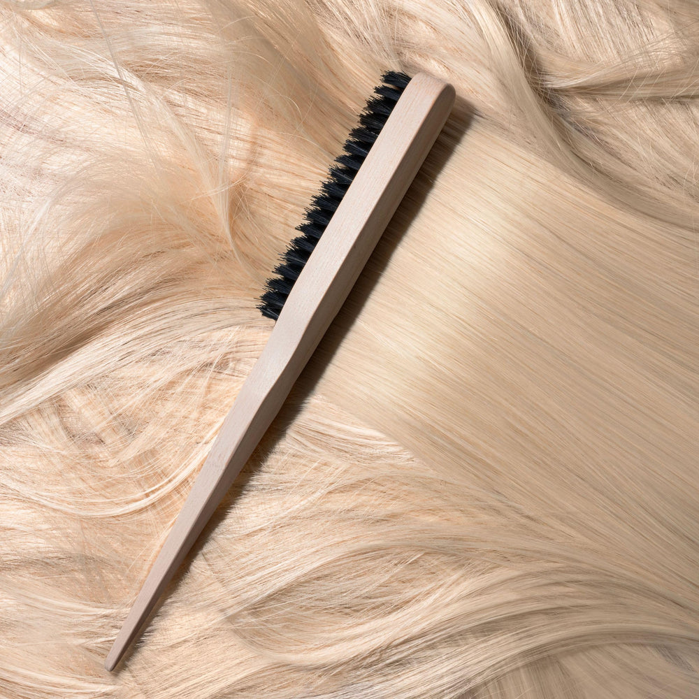 EcoTools Slick Back Brush renewable bamboo handle close-up