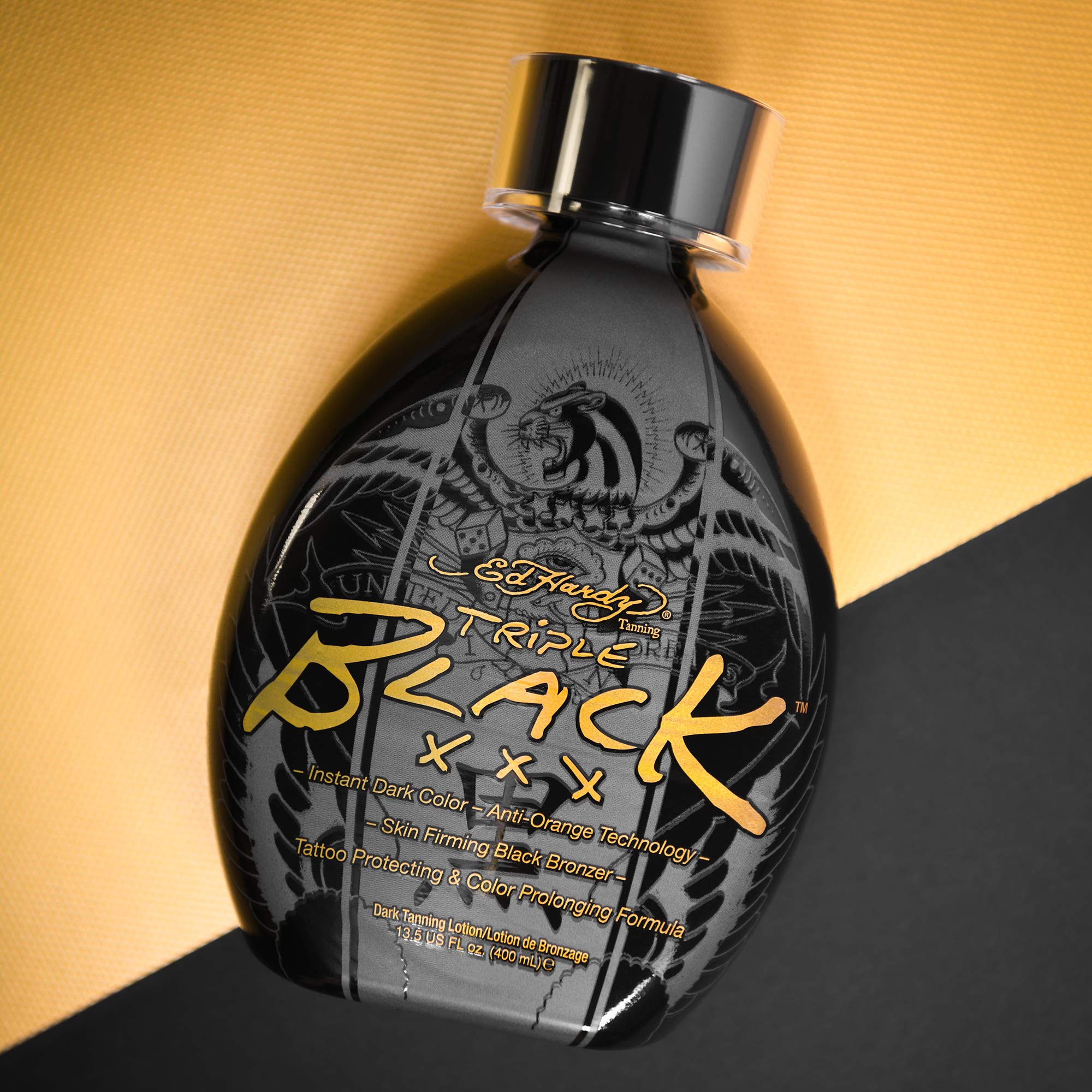 Creamy Ed Hardy Black XXX formula texture for even coverage on skin.