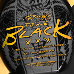Blue Tansy protects tattoo color during tanning with Ed Hardy Black XXX.