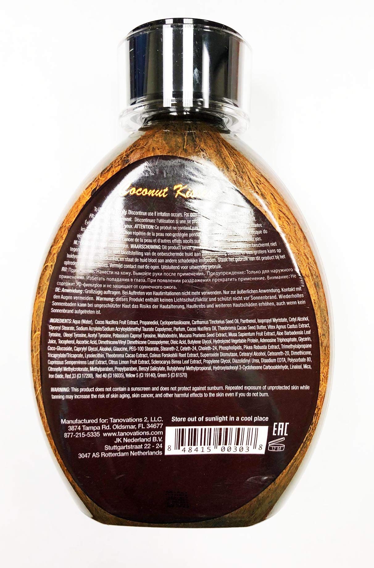 Lotion being applied from Ed Hardy Coconut Kisses for deep moisture and rich tan