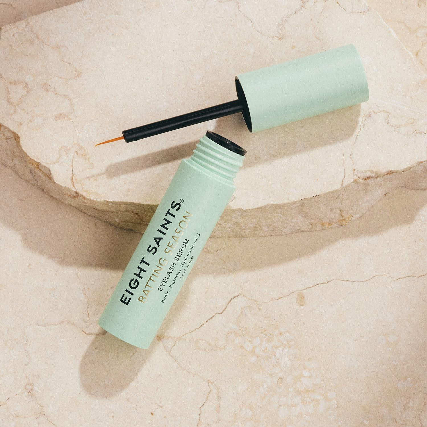 Eight Saints graphic featuring biotin, peptides, and hyaluronic acid for lash health.