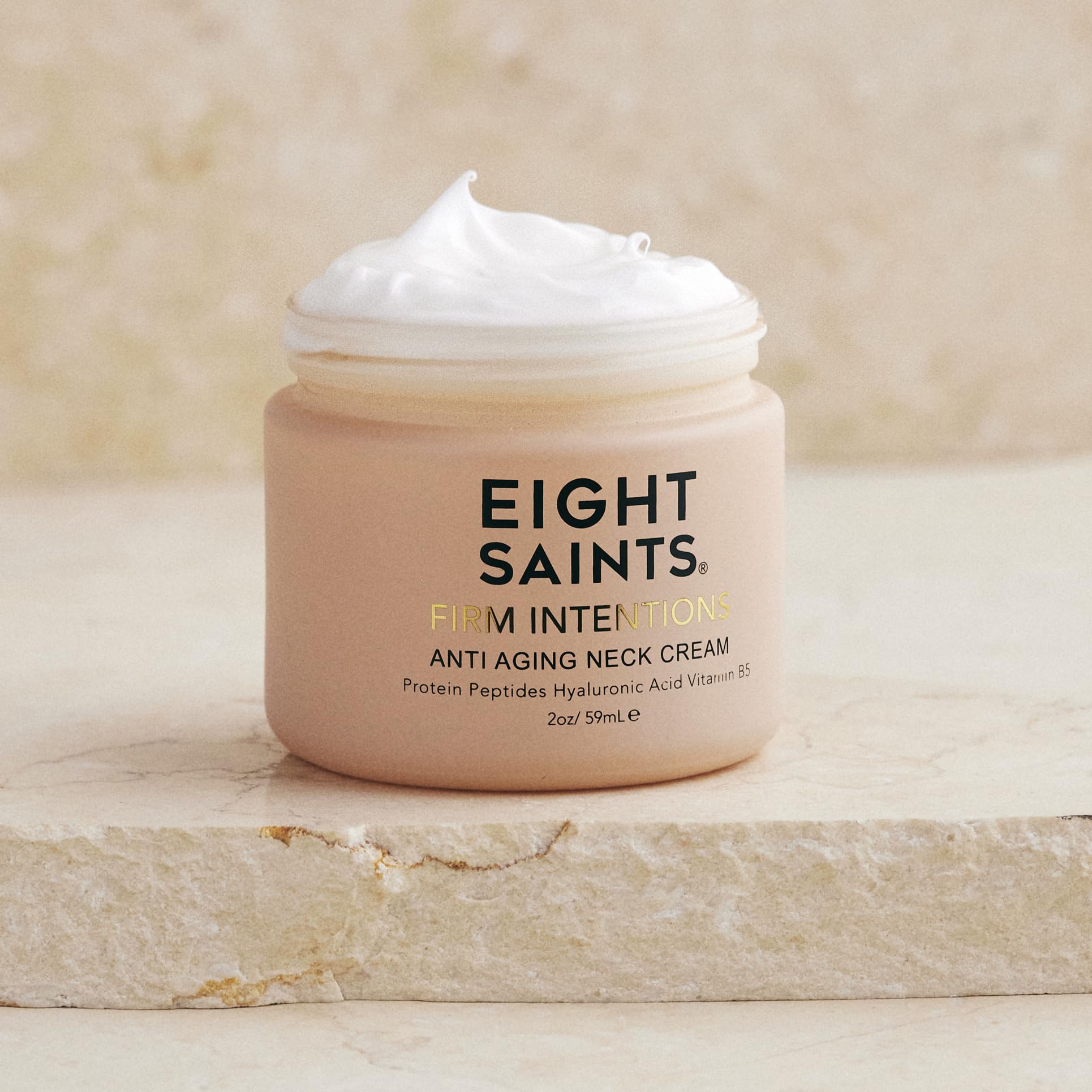 Eight Saints Firm Intentions neck cream application showing quick absorption
