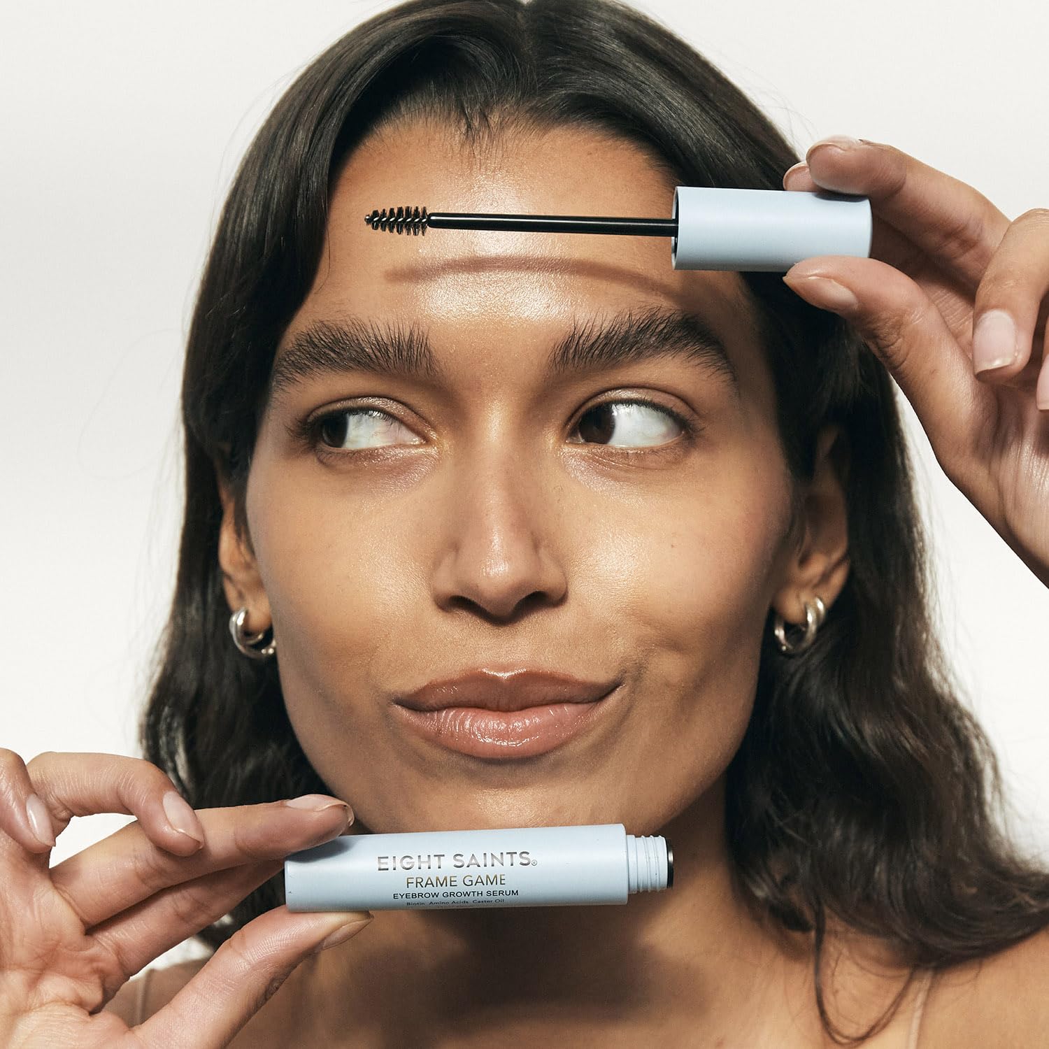 Eight Saints Frame Game applicator brush for precise brow application.